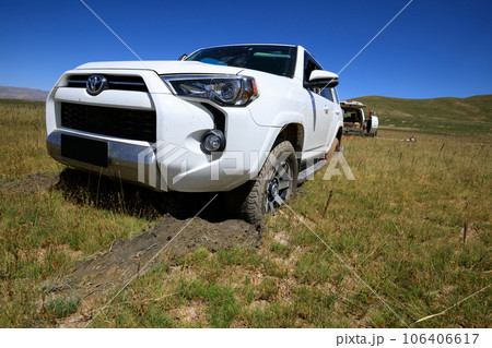 Offroad car got stuck in the mud 106406617
