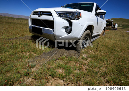 Offroad car got stuck in the mud 106406618