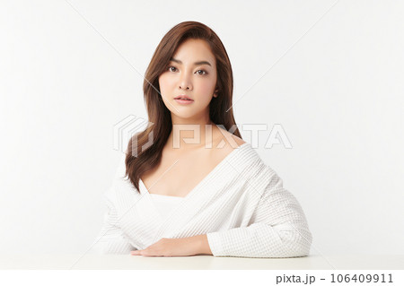 Beautiful young asian woman with clean fresh skin on white background, Face care, Facial treatment, Cosmetology, beauty and spa, Asian women portrait. Beautiful young asian woman with clean fresh skin on white background, Face care, Facial treatment, Cosmetology, beauty and spa, Asian women portrait. 106409911