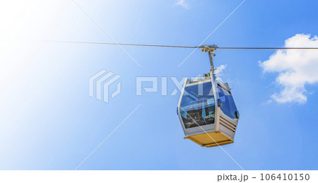 Cable car cabin against the blue sky close-up Cable car cabin against the blue sky close-up 106410150