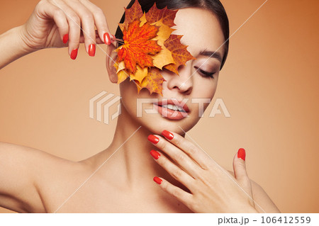 Autumn portrait of beautiful woman with clean fresh skin Autumn portrait of beautiful woman with clean fresh skin 106412559