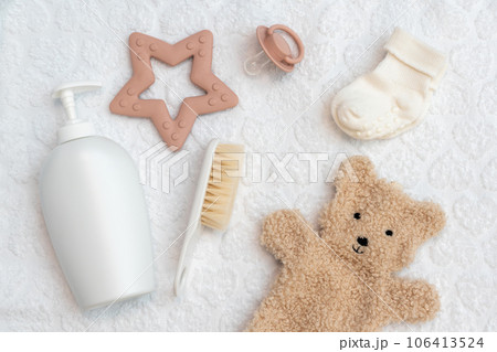 Thoughtfully arranged newborn accessories, showcasing infant essentials in top view, perfect flat lay composition 106413524