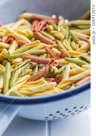 Fusilli pugliesi. Italian twisted pasta in colander. Fusilli pugliesi. Italian twisted pasta in colander. 106413653