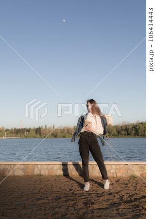 Portrait of a beautiful girl with a book. 106414443