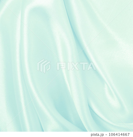 Smooth elegant blue silk or satin luxury cloth texture as abstract background. Luxurious background design 106414667