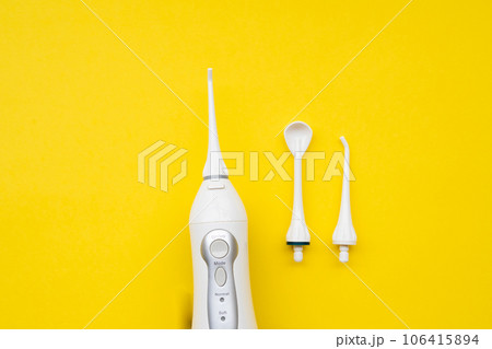 Mouth aerator on a yellow background with different nozzles. View from above 106415894