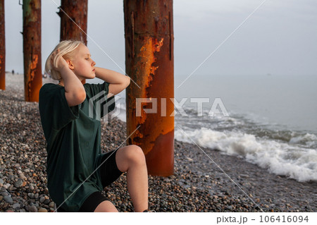 Beautiful young adult woman outdoor portrait Beautiful young adult woman outdoor portrait 106416094