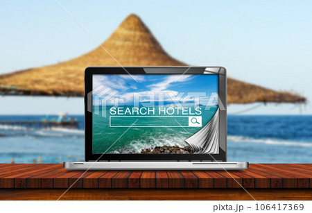 Search Hotels Website on Laptop Computer Screen - Booking Concept 106417369