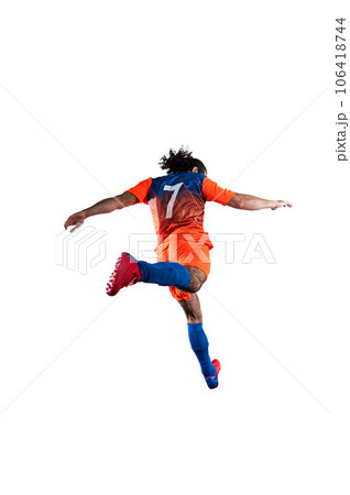 Soccer  player play with soccerball during a football match 106418744