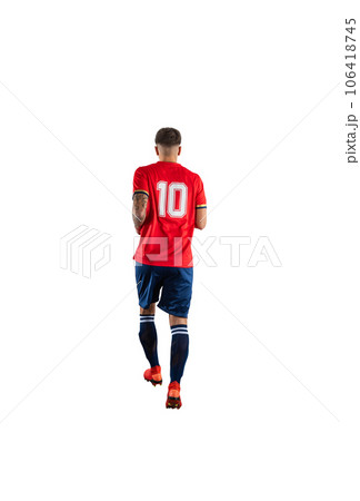 Soccer  player play with soccerball during a football match 106418745