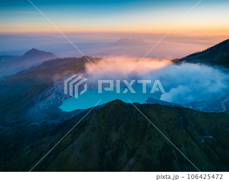 Aerial view of mount Kawah Ijen volcano crater at sunrise, East Java, Indonesia Aerial view of mount Kawah Ijen volcano crater at sunrise, East Java, Indonesia 106425472