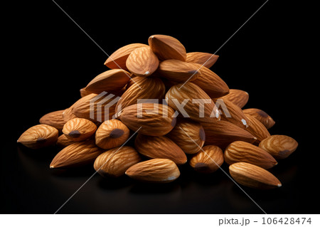 Group of almonds isolated on black 106428474