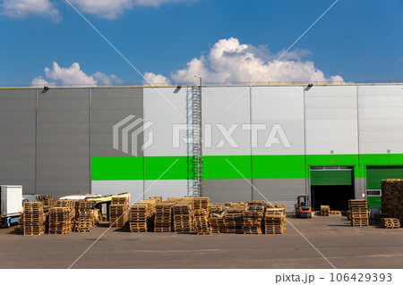 Wooden pallets heap in the cargo warehouse 106429393