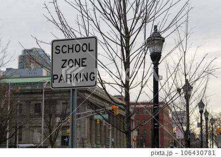 sign school zone parking in a down town, New Jersey, USA 106430781