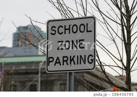 sign school zone parking in a down town, New Jersey, USA 106430795