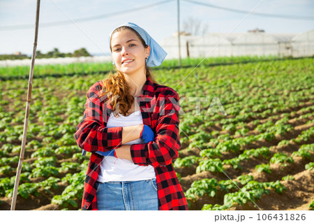 Smiling professional female farmer on a plantation Smiling professional female farmer on a plantation 106431826