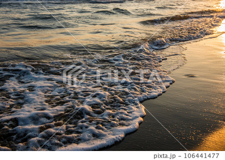 Waves approaching sandy beach Waves approaching sandy beach 106441477