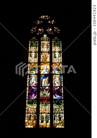 Stained glass window detail with Biblical scene 106441923
