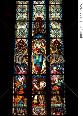 Stained glass window detail with Biblical scene 106441925