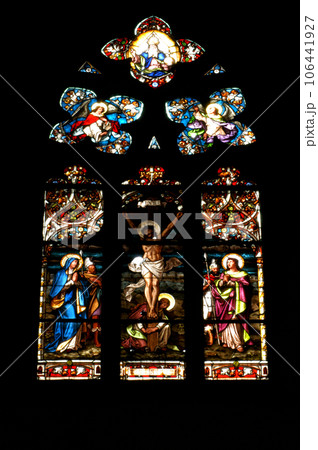 Stained glass window detail with Biblical scene 106441927