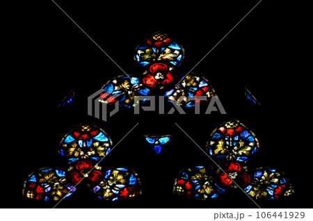 Stained glass window detail with Biblical scene 106441929
