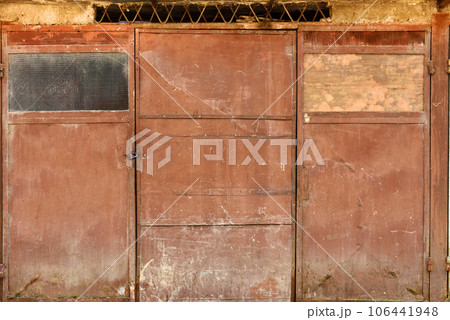 Grunge metallic brown garage door 106441948