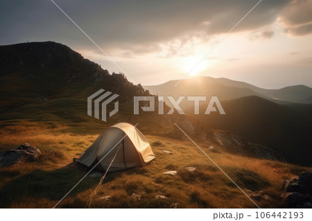 The perfect getaway: a picturesque tent surrounded by stunning mountain ranges, set against the backdrop of a beautiful sunset. AI Generative. 106442193