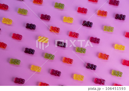 background of various jelly sweets, bears, close-up top view.  106451593