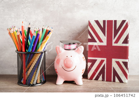 Graduation hat with colorful pencils on book with copy space, learning university education concept. 106451742
