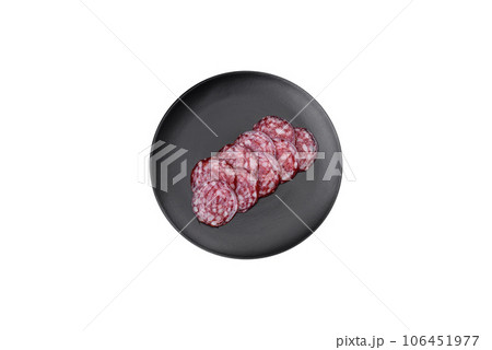 Delicious smoked sausage with bacon, salt, spices and herbs Delicious smoked sausage with bacon, salt, spices and herbs 106451977