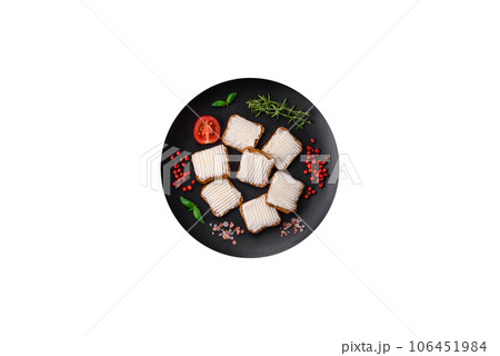 Delicious salty rectangular wheat croutons with cream cheese and tomatoes Delicious salty rectangular wheat croutons with cream cheese and tomatoes 106451984