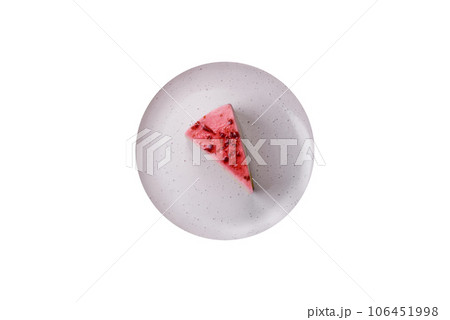 Delicious sweet dessert cheesecake with raspberry and pistachio flavor Delicious sweet dessert cheesecake with raspberry and pistachio flavor 106451998