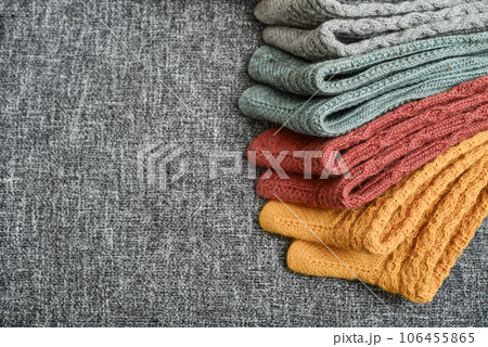 Hand-knitted woolen socks of different colors Hand-knitted woolen socks of different colors 106455865