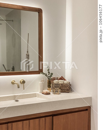 Modern bathroom with golden modern mixer tap Modern bathroom with golden modern mixer tap 106456177