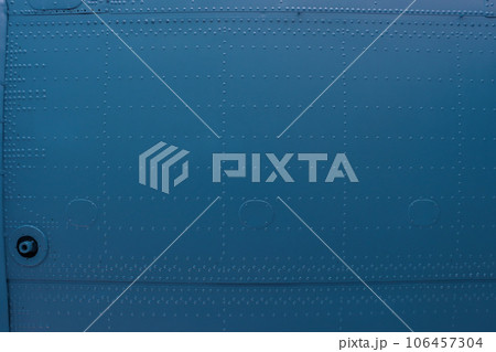Abstract background from the aluminum skin of the aircraft. 106457304