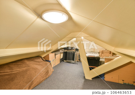 the inside of a room that is being used as an office space for people to work and have their desks the inside of a room that is being used as an office space for people to work and have their desks 106463653