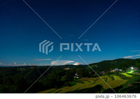 月光に照らされた収穫期の棚田の夜景イメージ【岡山県美咲町】 月光に照らされた収穫期の棚田の夜景イメージ【岡山県美咲町】 106463676