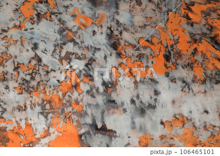 Abstract texture background. Sanded brushed metal surface with orange paint. Empty butt. Abstract texture background. Sanded brushed metal surface with orange paint. Empty butt. 106465101