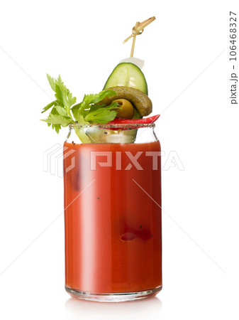Cocktail with vodka and juice bloody mary with pickle and olive on white. Cocktail with vodka and juice bloody mary with pickle and olive on white. 106468327