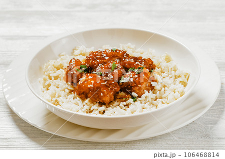 Baked Honey Sesame Chicken with brown rice Baked Honey Sesame Chicken with brown rice 106468814