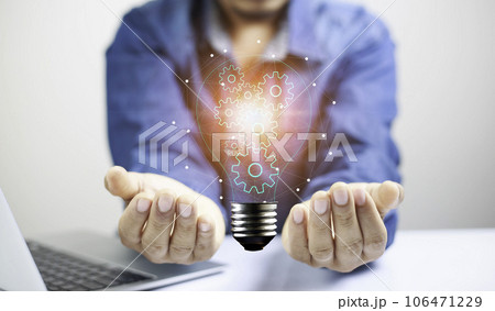 Businessman Touching Icon Bulb.Concept of Ideas for success.Concept with innovation inspiration.Success start from new ideas to innovative technology relying on information from the internet big data. Businessman Touching Icon Bulb.Concept of Ideas for success.Concept with innovation inspiration.Success start from new ideas to innovative technology relying on information from the internet big data. 106471229