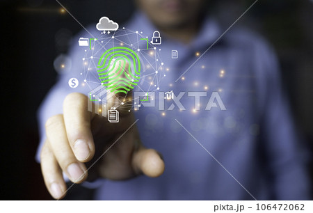 Businessman scan fingerprint with virtual screen interface to enter internet network.Futuristic virtual screen interface technology. Cyber security concept to protect information on internet network. 106472062