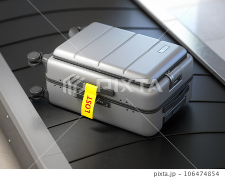 Suitcase with lost sticker on an airport baggage conveyor or baggage claim transporter. 106474854