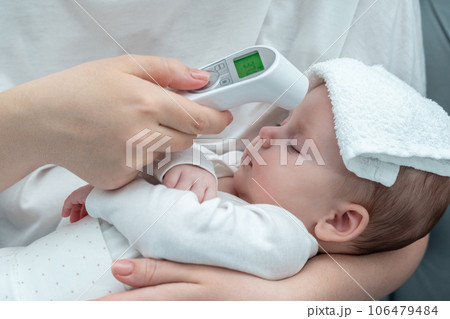 Maternal concern in the digital age. Concept of modern ways to ensure infant health 106479484