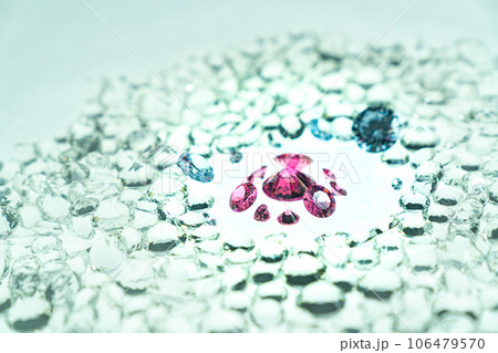 Pink gemstones is displayed on a white background swirling around. Pink diamonds of various sizes and shapes are displayed in the middle of white diamonds. Sweet pink diamonds.white gems background Pink gemstones is displayed on a white background swirling around. Pink diamonds of various sizes and shapes are displayed in the middle of white diamonds. Sweet pink diamonds.white gems background 106479570