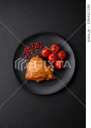 Delicious grilled chicken thighs with salt, spices and herbs 106482196