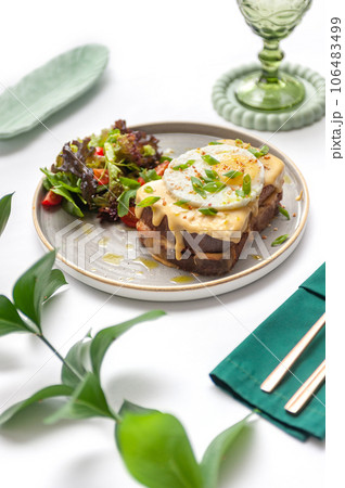 Set of breakfast dishes: croissants, toast, scrambled eggs, salad, bruschetta Set of breakfast dishes: croissants, toast, scrambled eggs, salad, bruschetta 106483499