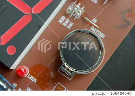Lithium Battery Coin On Electronic circuit. Lithium Battery Coin On Electronic circuit. 106484240