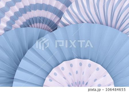 Beautiful blue paper fans background. 106484655