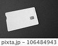 Green plastic bank card on a gray background. Mockup. Plastic card with chip. 106484943